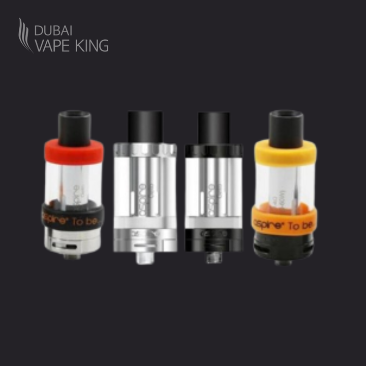 Four vape coils with different color options on a black background, branded as 'Dubai Vape King'.